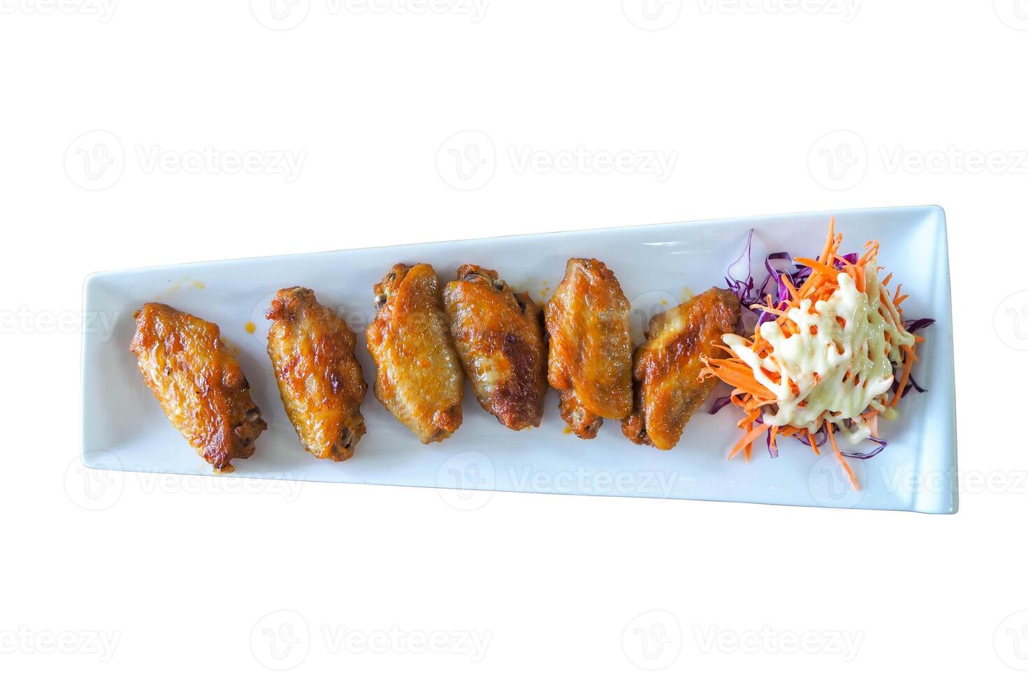 Sushi with chopsticks on a plate, surrounded by various delicious grilled and fried meats, seafood, and gourmet dishes photo