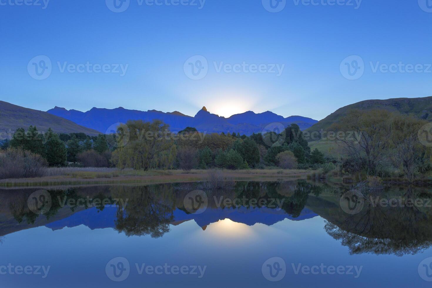 Reflection of Rhino Peak on the water photo