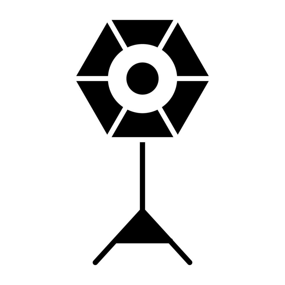 A solid design icon of studio light vector