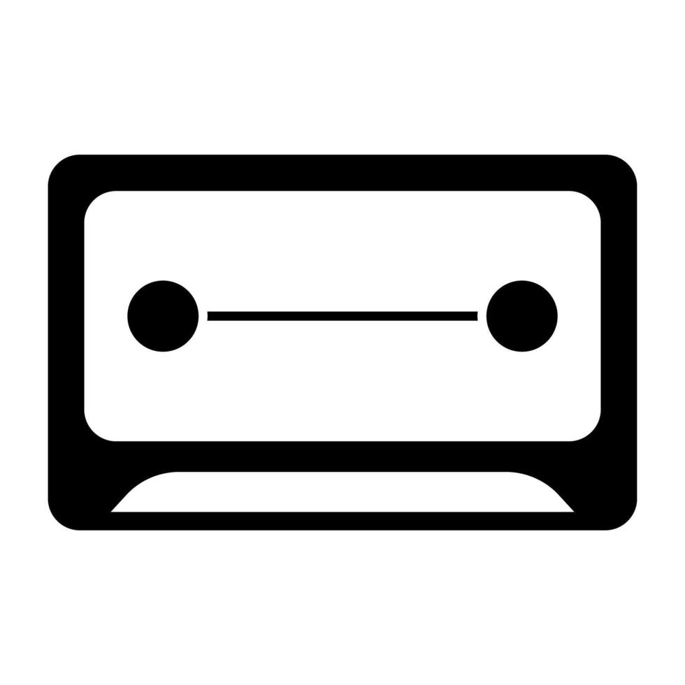 Audio cassette icon in solid design vector