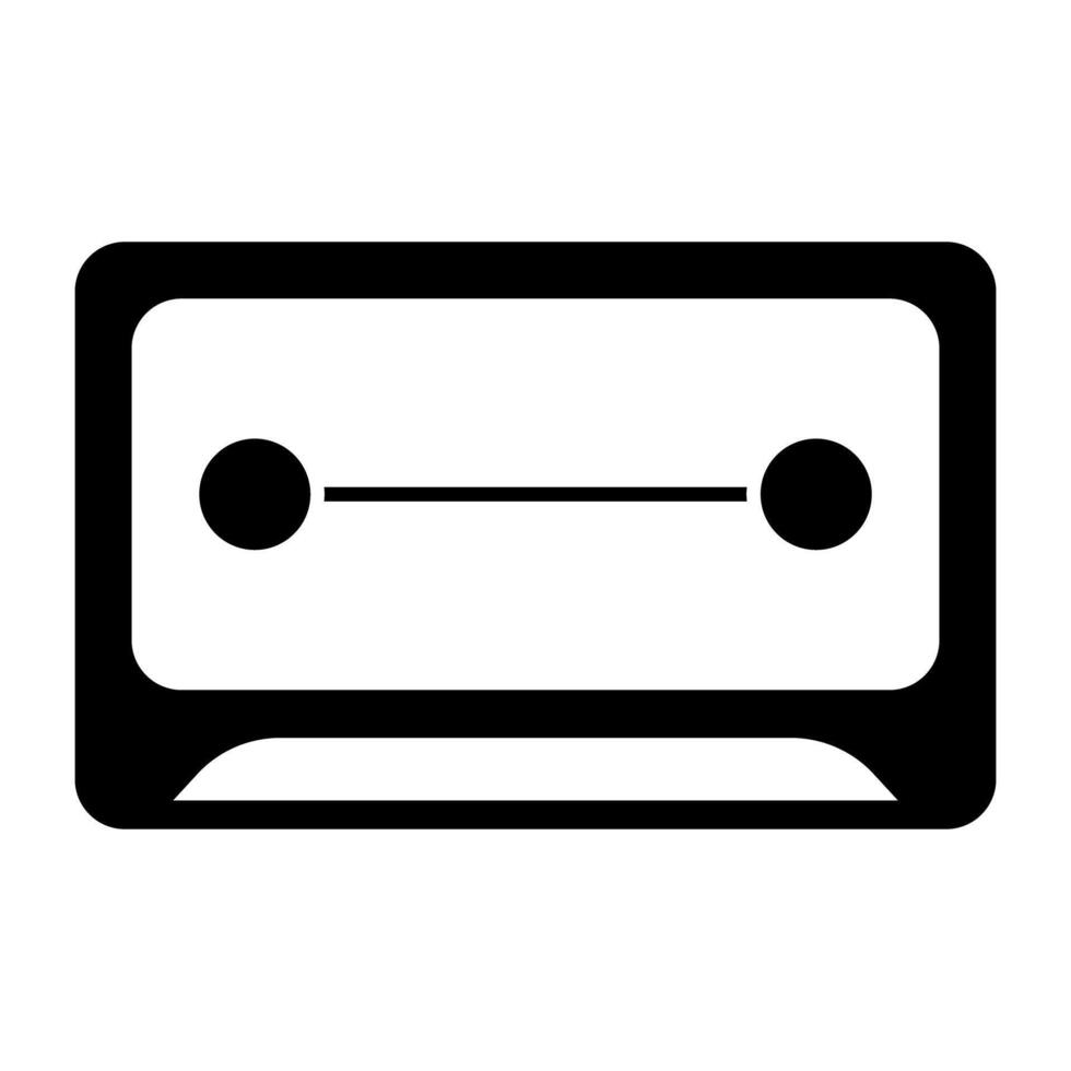 Audio cassette icon in solid design vector