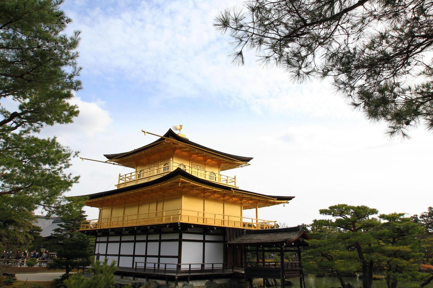 Golden pavilion or castle with copy space. This place call Kinkakuji Temple, Kyoto Japan. Ancient, old building with exterior design. Famous place for travel and visits to Asia. photo