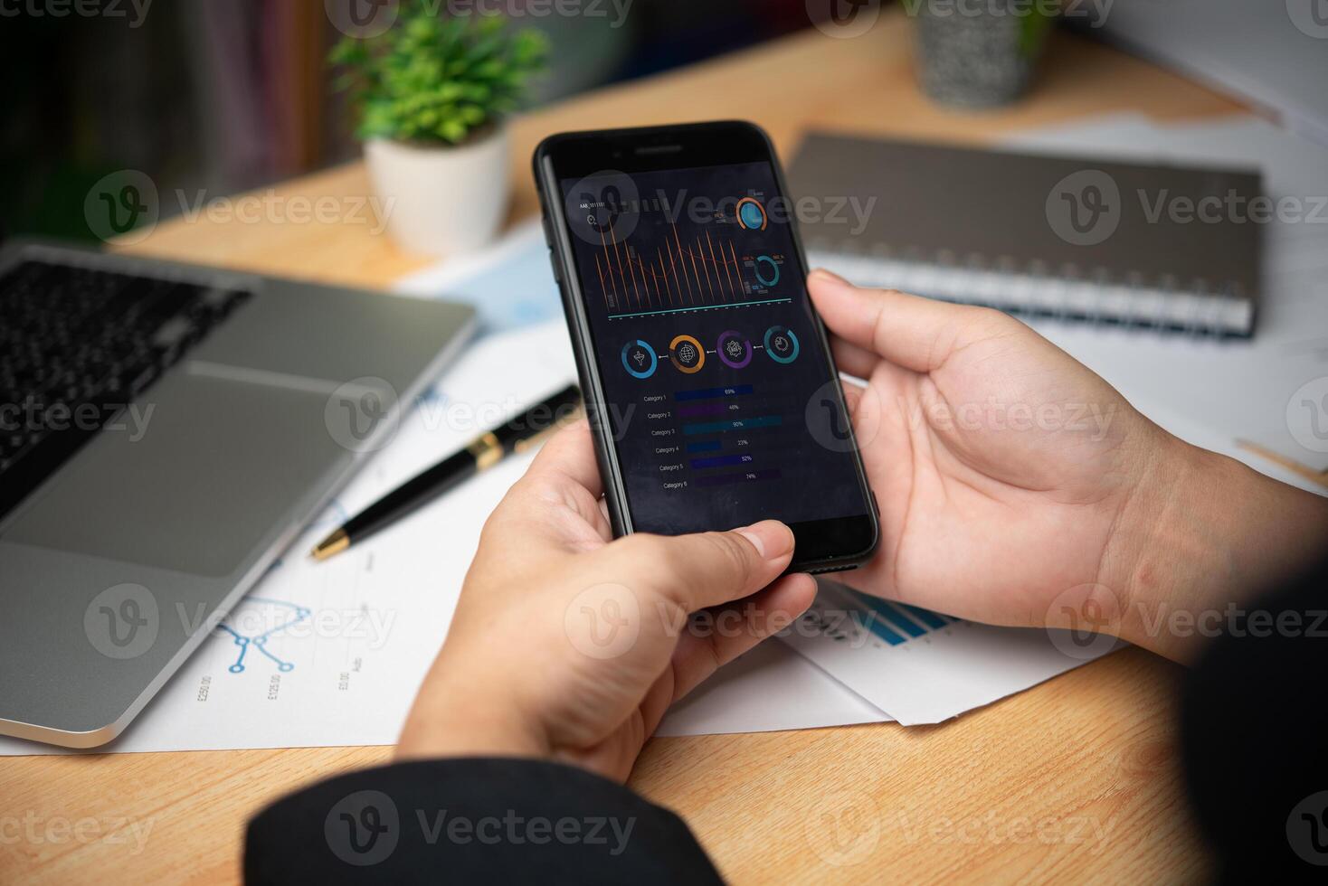 Businessman using smartphone development and technology Data analyst for report marketing strategy planning. graph analysis and information. photo
