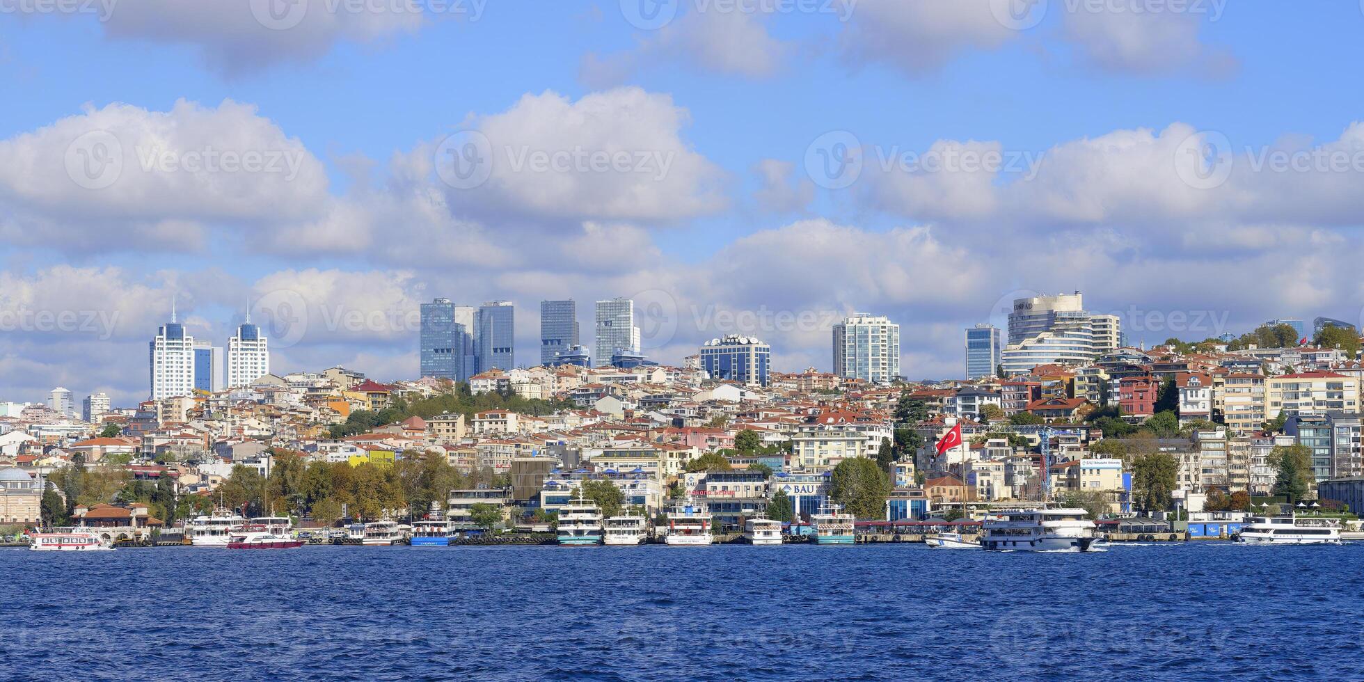 Skyline of Besiktas viewed from the Bosphorus, Istanbul, Turkey photo