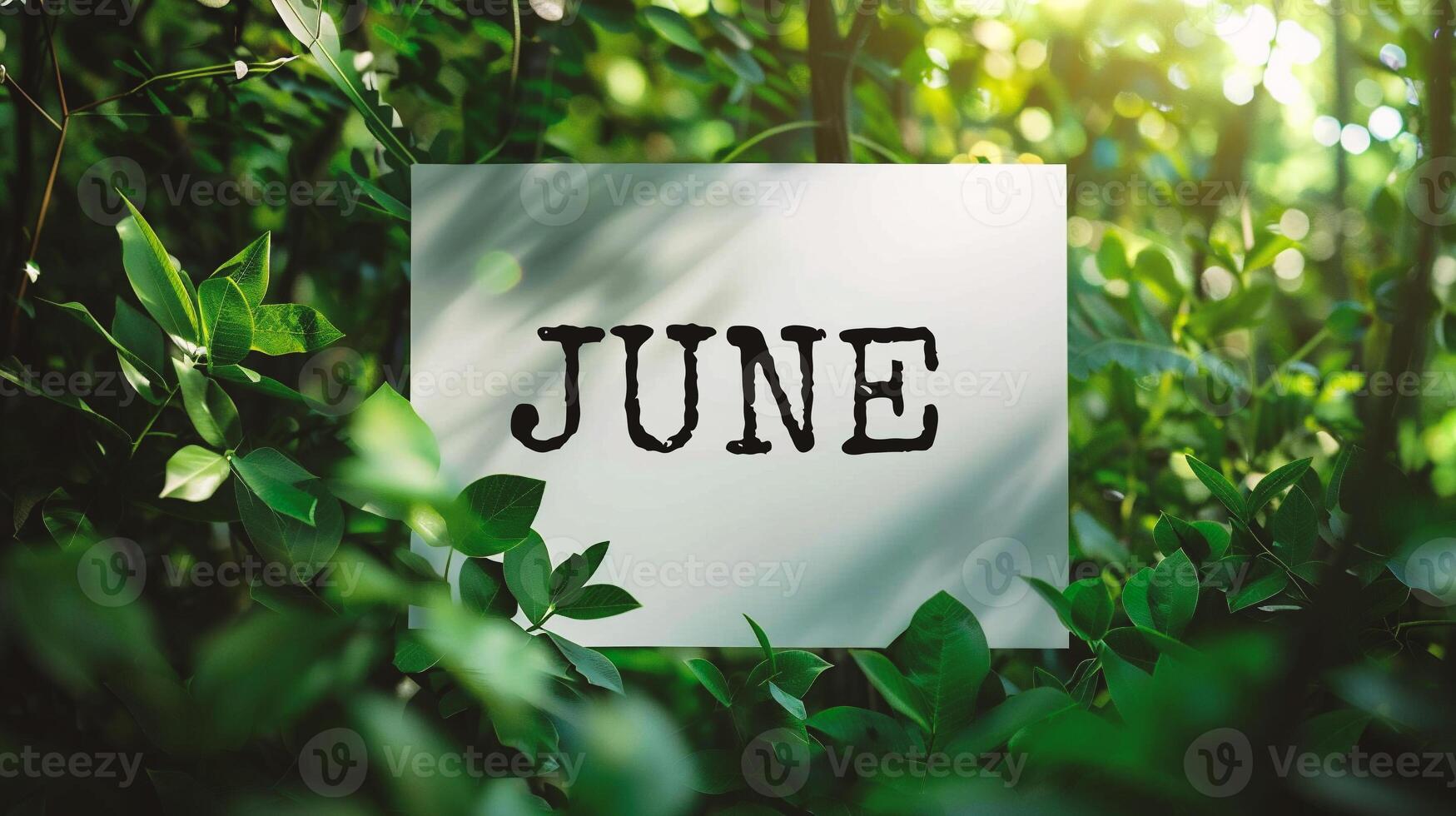 AI generated JUNE word on white paper card in the green nature background. photo