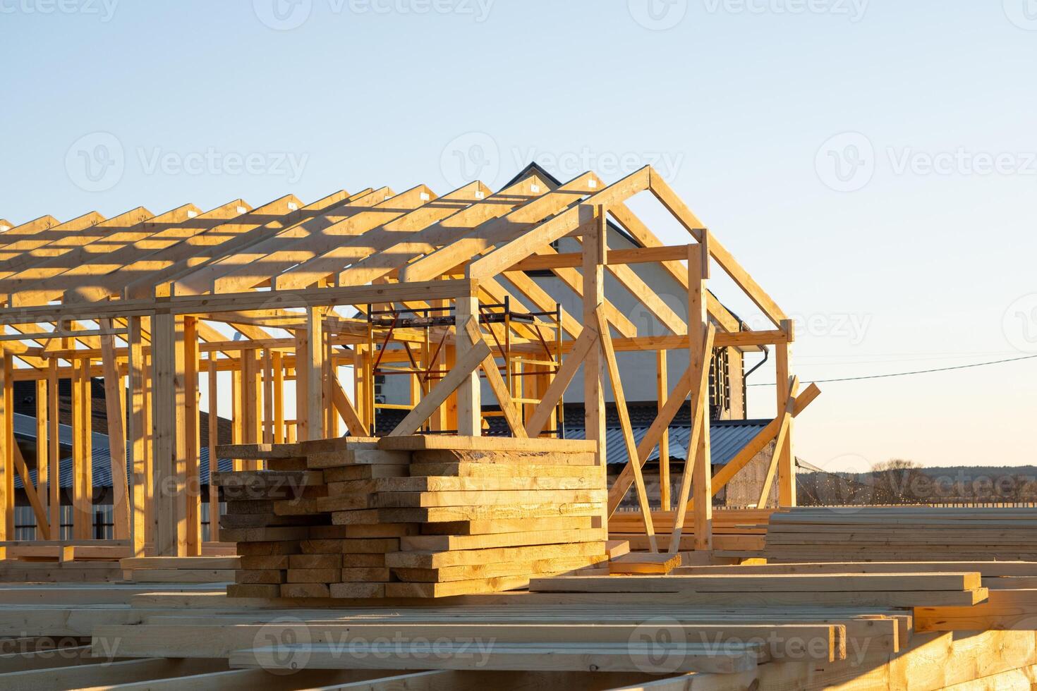 Construction of a wooden frame house - frame from the foundation, walls, roof on stilts is a construction site, the process of building a frame photo