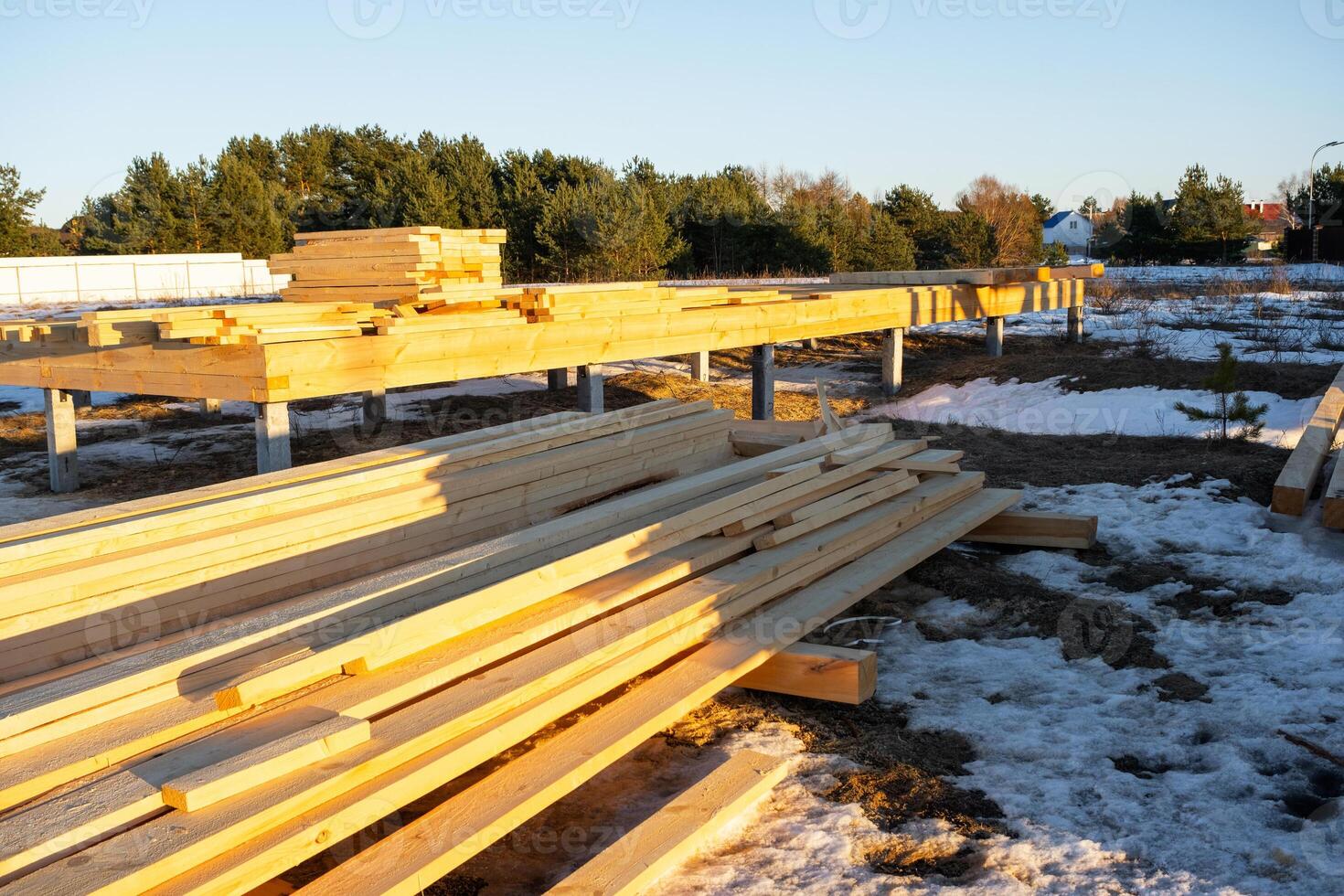 The foundation of a wooden frame house on stilts is a construction site, the process of building a frame photo