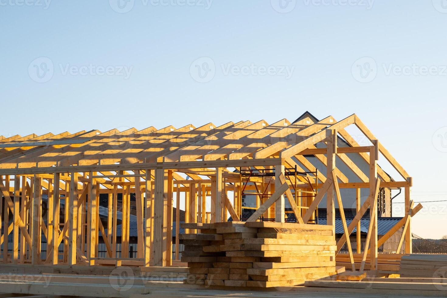 Construction of a wooden frame house - frame from the foundation, walls, roof on stilts is a construction site, the process of building a frame photo