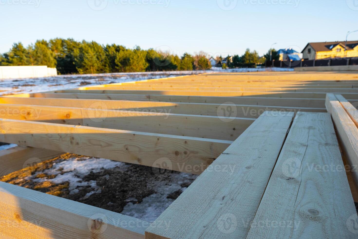 The foundation of a wooden frame house on stilts is a construction site, the process of building a frame photo