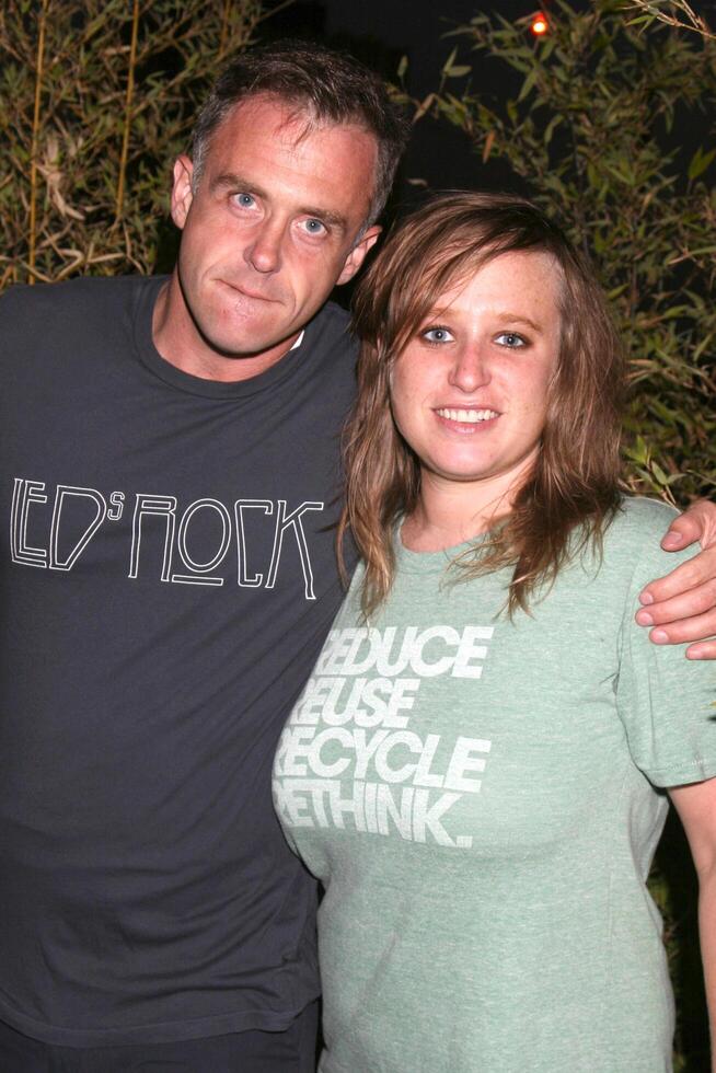 David Eigenberg wearing COTAM shirt with Carly Miller while attending the Daytime for Planned Parenthood Event at a rooftop in Hollywood CA June 18 2008   Hutchins Photo