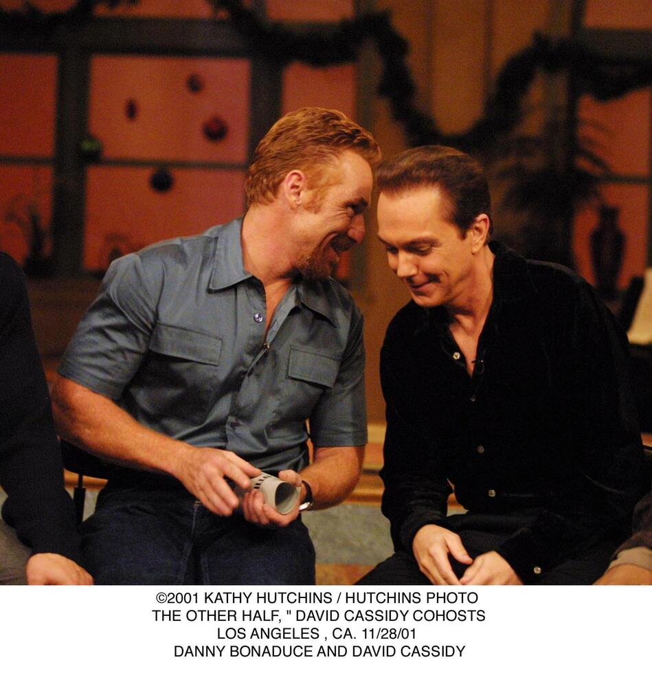 2001   . THE OTHER HALF,   DAVID CASSIDY COHOSTS.LOS ANGELES, CA. 112801. DANNY BONADUCE AND DAVID CASSIDY photo