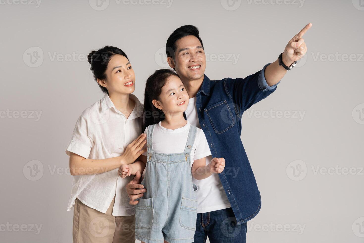 Asian family portrait posing on white background photo