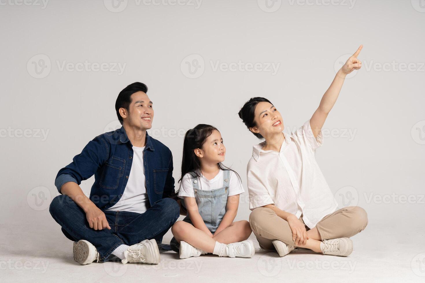 Asian family portrait posing on white background photo