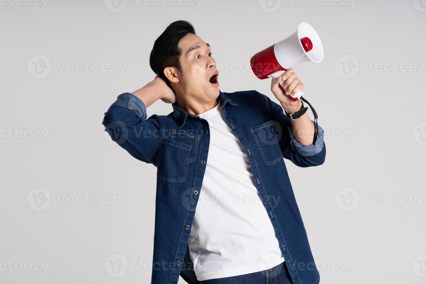 Portrait of Asian man posing on white background photo