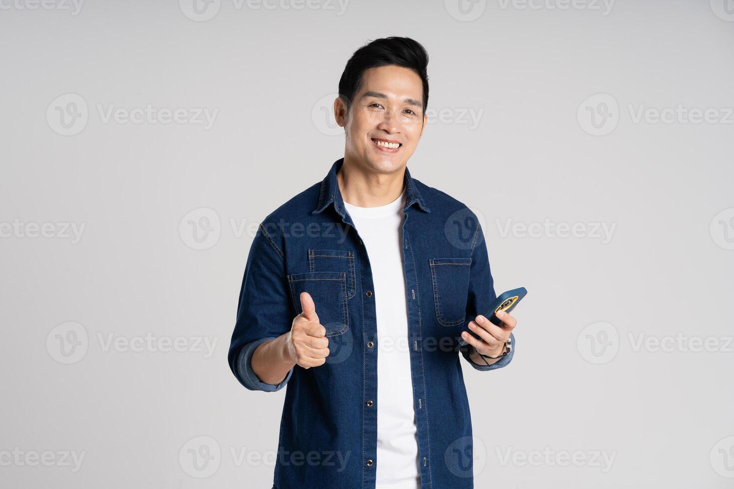 Portrait of Asian man posing on white background photo