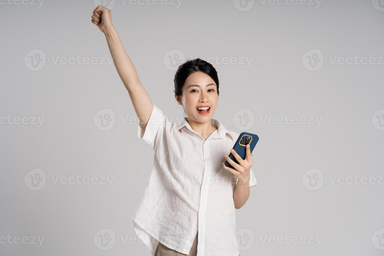 Portrait of beautiful asian woman posing on white background photo