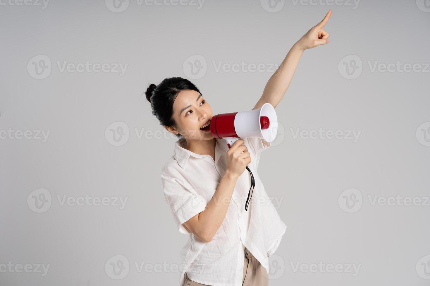 Portrait of beautiful asian woman posing on white background photo