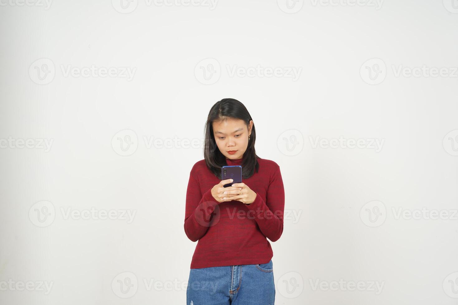 Young Asian woman in Red t-shirt Smile while using smartphone, Texting concept isolated on white background photo