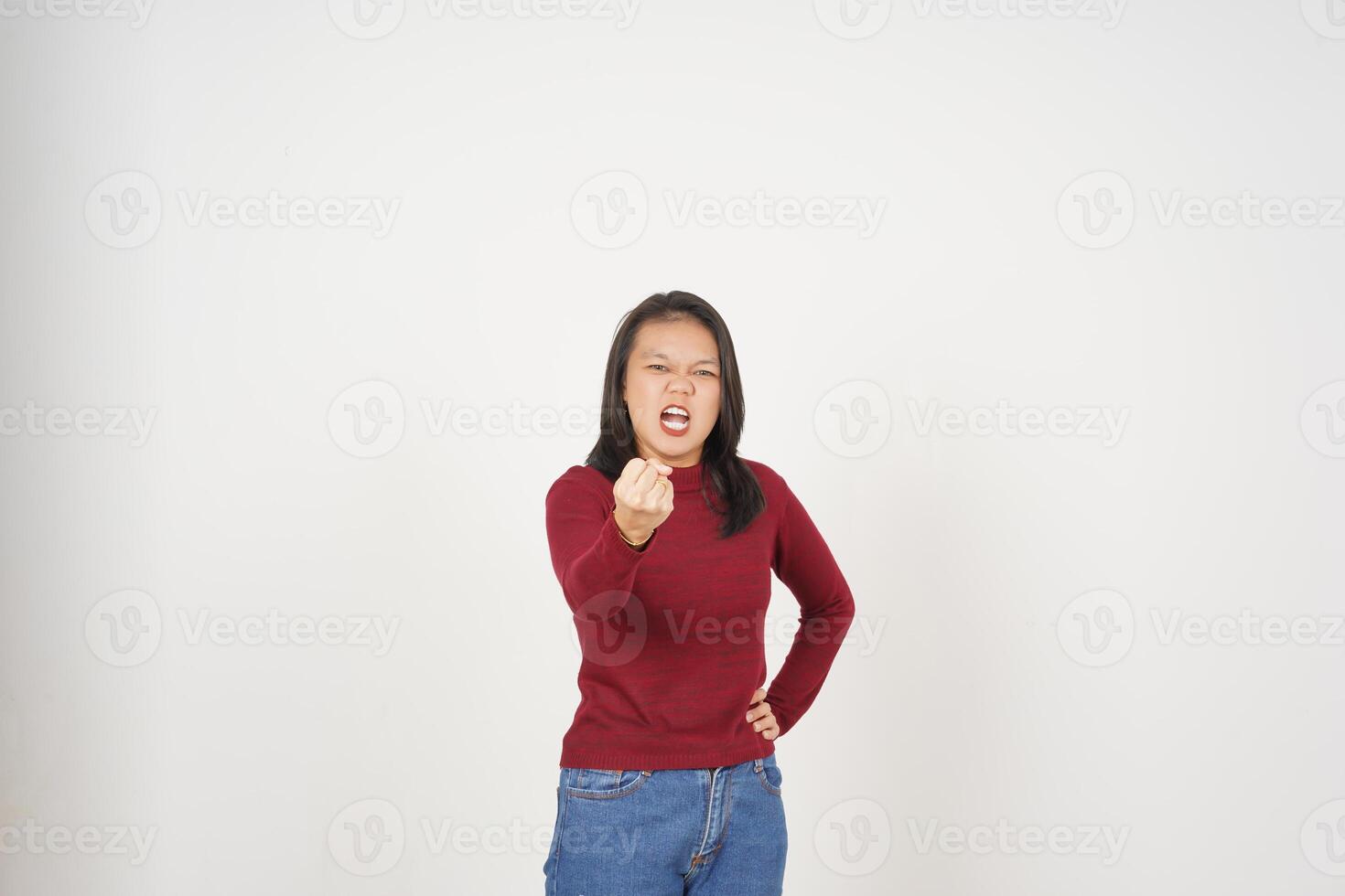 Young Asian woman in Red t-shirt Pointing at You with angry gesture isolated on white background photo