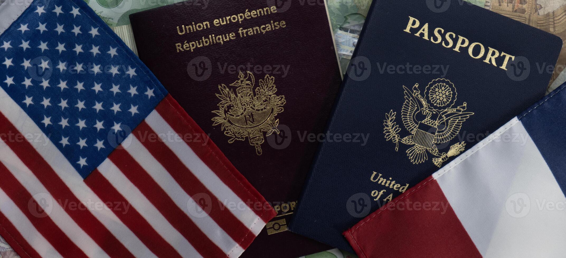 Flags of United States and France passports on currency transparent background photo