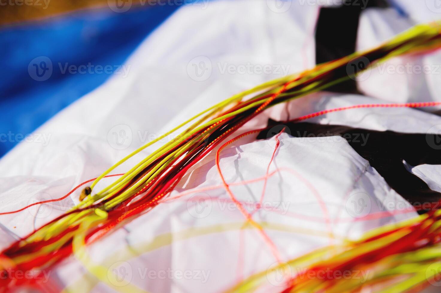 Control lines. Brakes. Paragliding system lines. Soft link. Paragliding from the inside. Slings. Close-up of the line attaching to the wing fabric photo