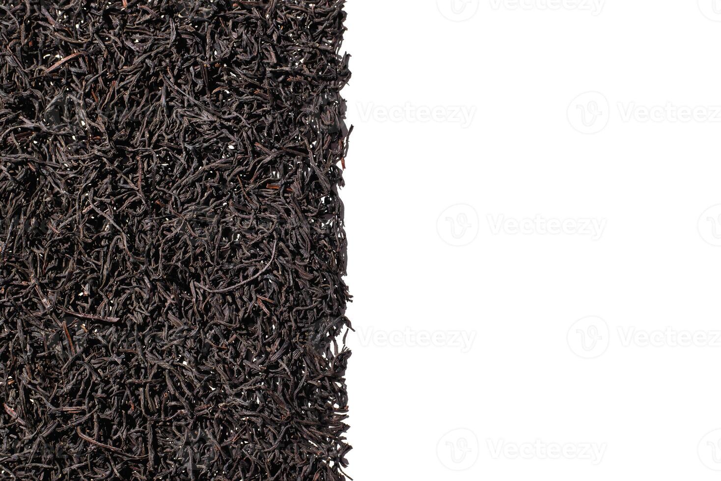 Dry tea leaves isolated on white background, top view. Blank space on the right for text photo