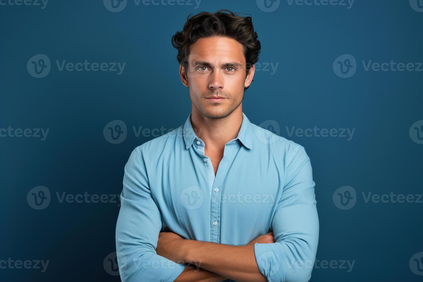 AI generated Studio portrait of waist-length male, handsome adult confident caucasian man in shirt with his hands together on blue background photo
