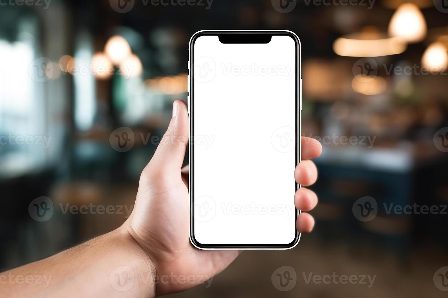 AI generated Close-up hand holding smartphone mockup in cafe indoors, mobile phone with white blank screen with space for branding photo