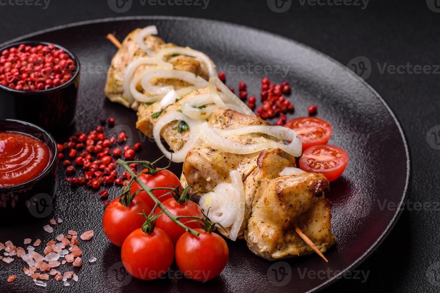 Delicious fresh chicken meat kebab with salt, spices and herbs photo
