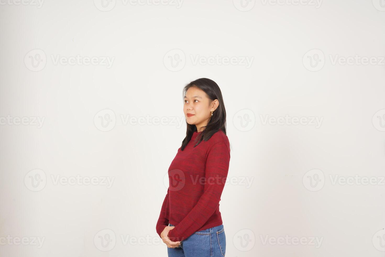 Young Asian woman in Red t-shirt looking aside and smile isolated on white background photo