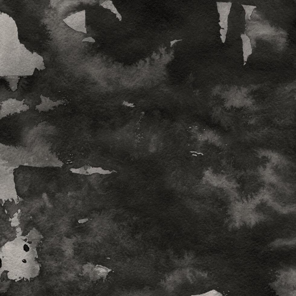 Paint splatter texture on dark background photo