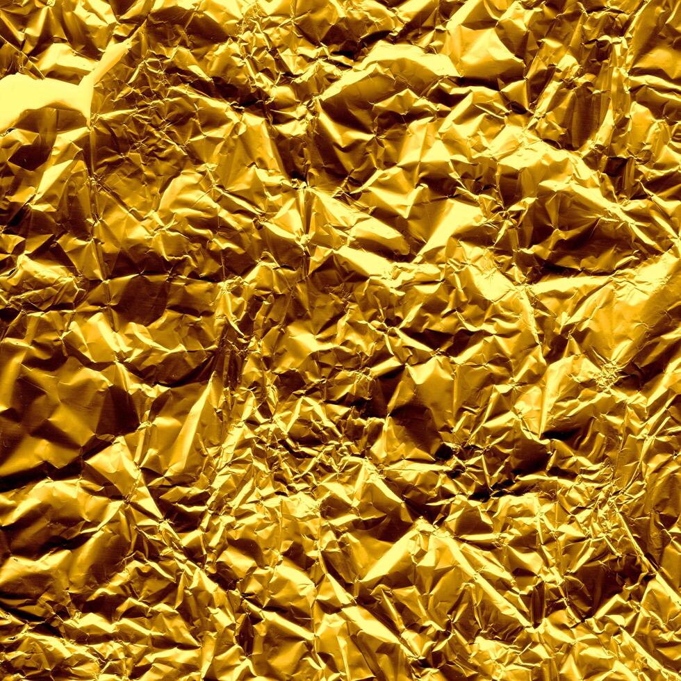 arrugado oro papel textura foto