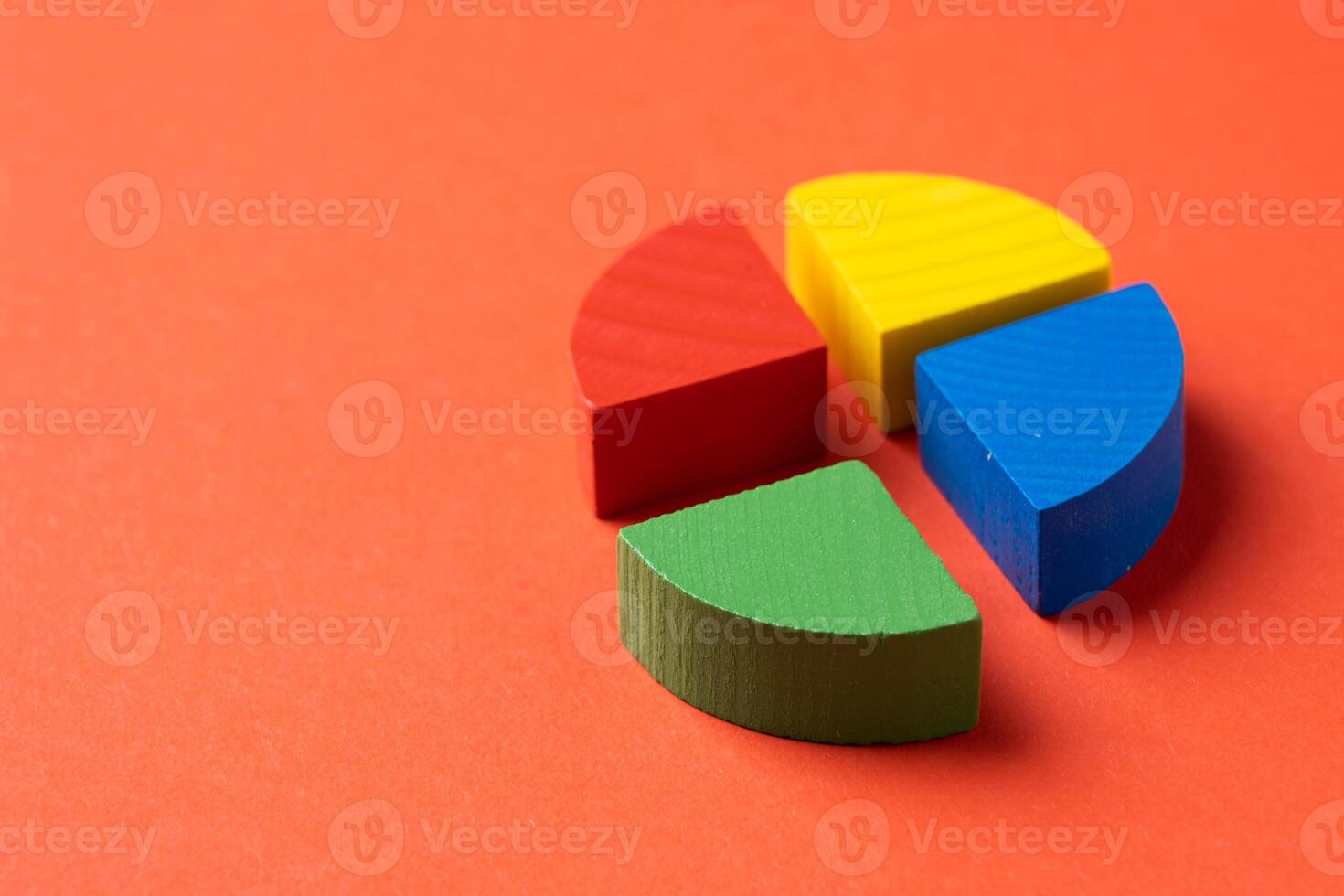 Colorful wooden pie chart pieces photo