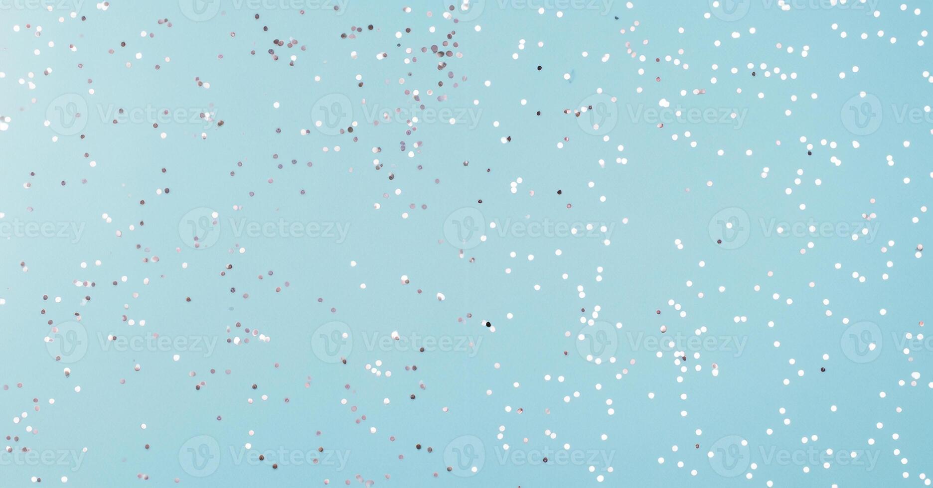 Wide photo picture of mock up background of shiny silver color confetti on light pastel color background