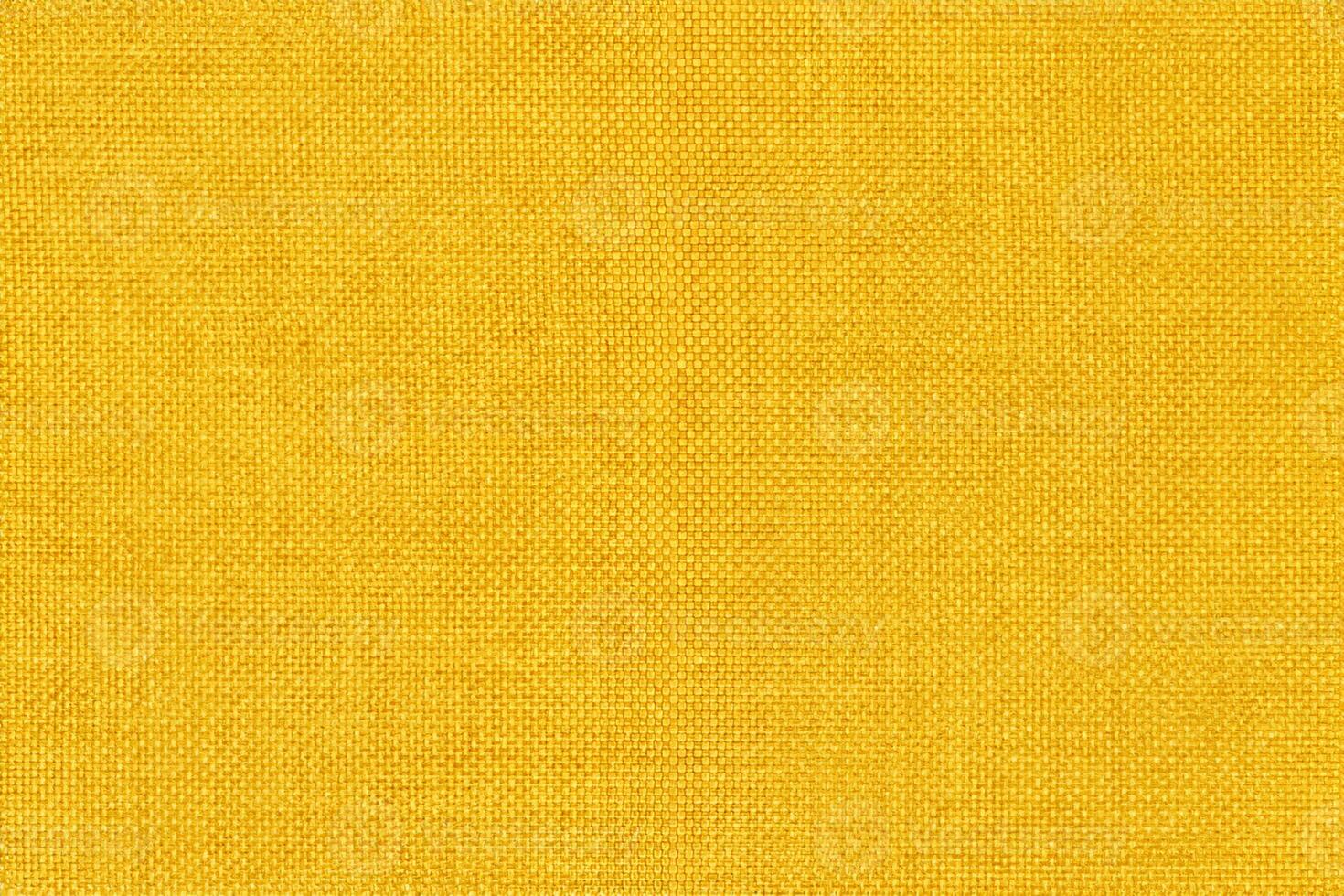 Yellow fabric cloth texture background, seamless pattern of natural textile. photo