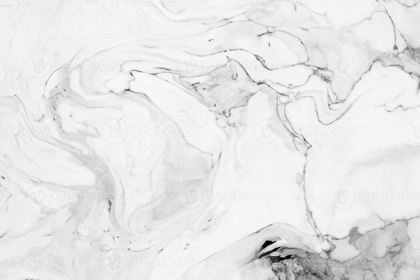 This high definition white marble texture wall features an abstract wave pattern, perfect for interior design. It can be used as a luxurious background or skin for high-end products. photo