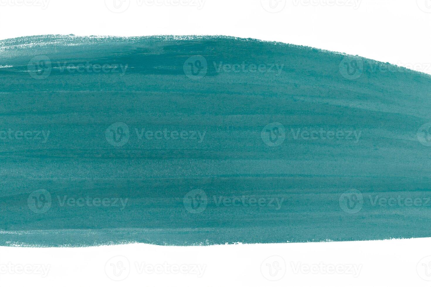 Brush with turquoise paint. Brush with a deep green color resembling a lake. photo