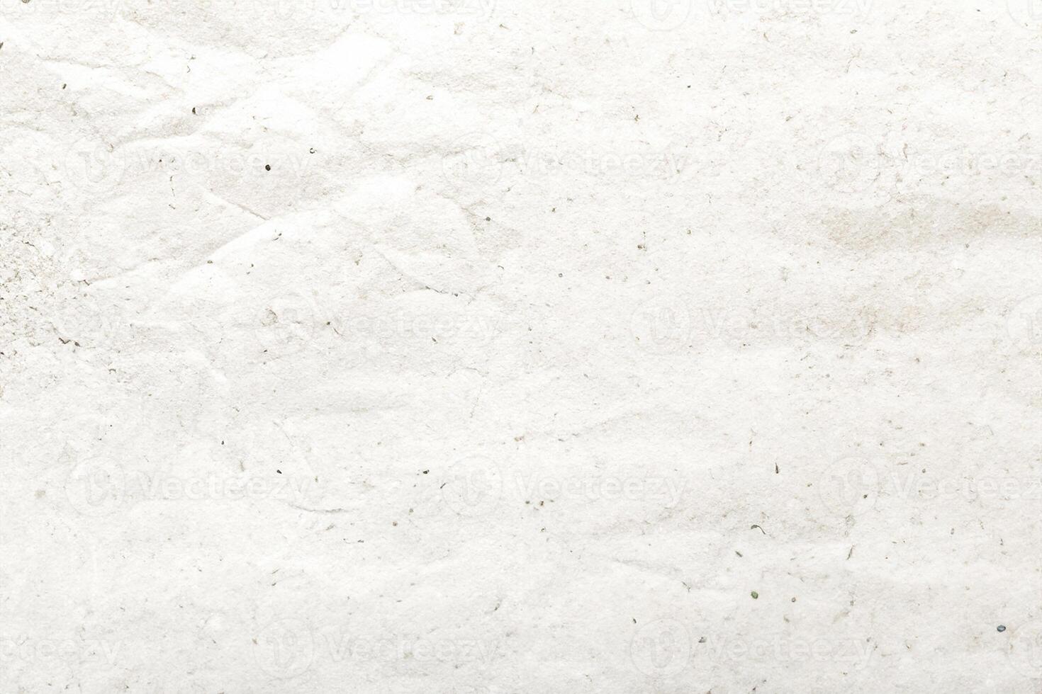 The background consists of a pattern and texture created by crumpled white paper. photo