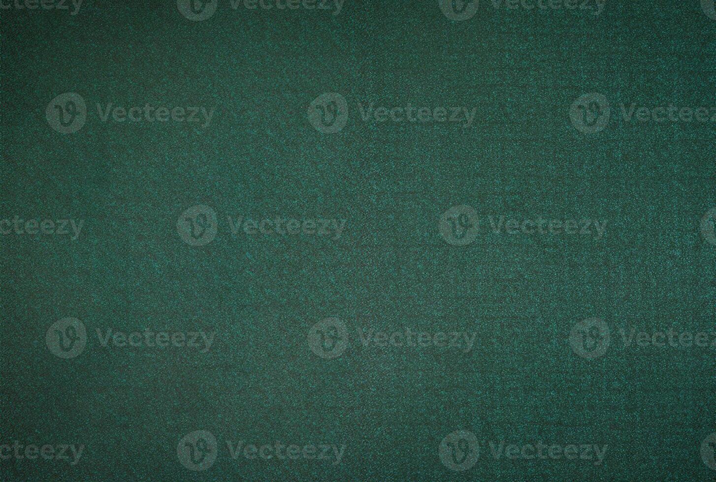 abstract festive background of dark fabric and green photo