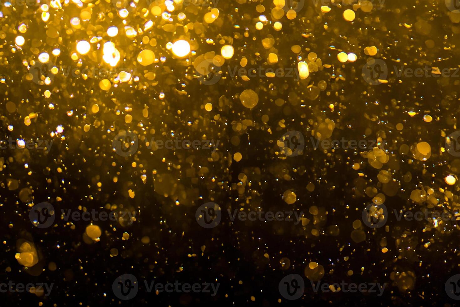 Golden Elegance, Abstract Bokeh on Black Background photo