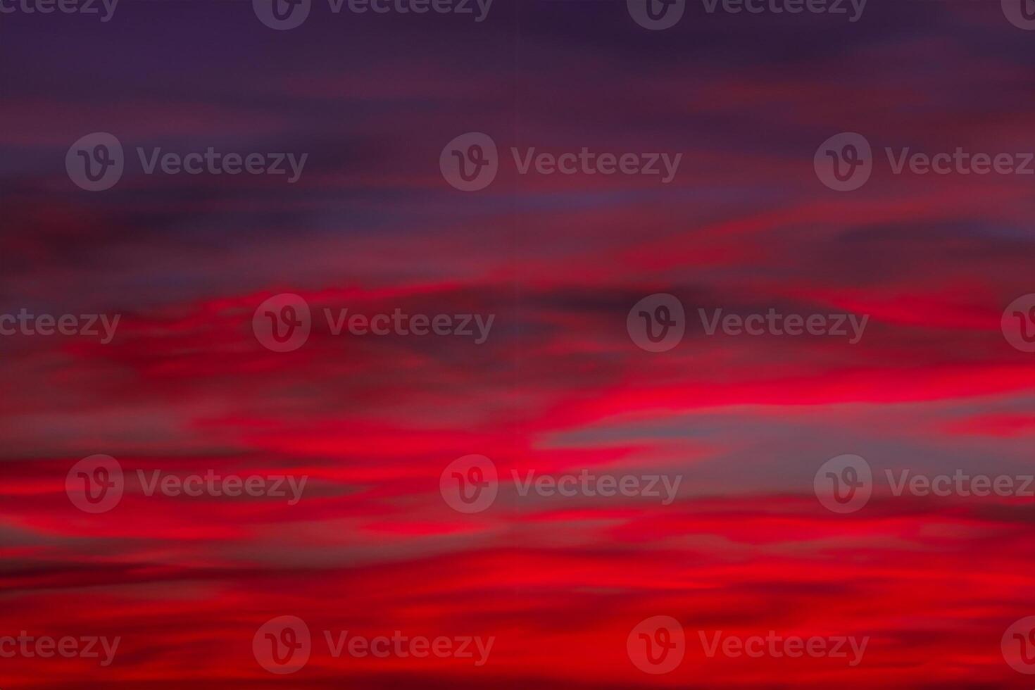 Luminous Horizons, Vivid, Colorful Clouds in a Dramatic Sunrise or Sunset Sky. A Gradient Journey from Cold to Warm Hues, a Defocused Abstract Background of Nature's Canvas. photo