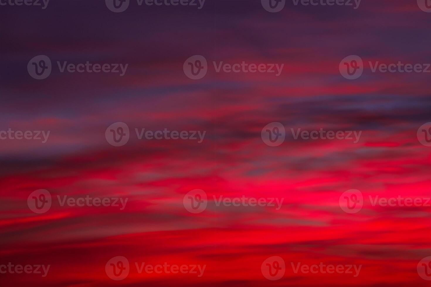 Luminous Horizons, Vivid, Colorful Clouds in a Dramatic Sunrise or Sunset Sky. A Gradient Journey from Cold to Warm Hues, a Defocused Abstract Background of Nature's Canvas. photo