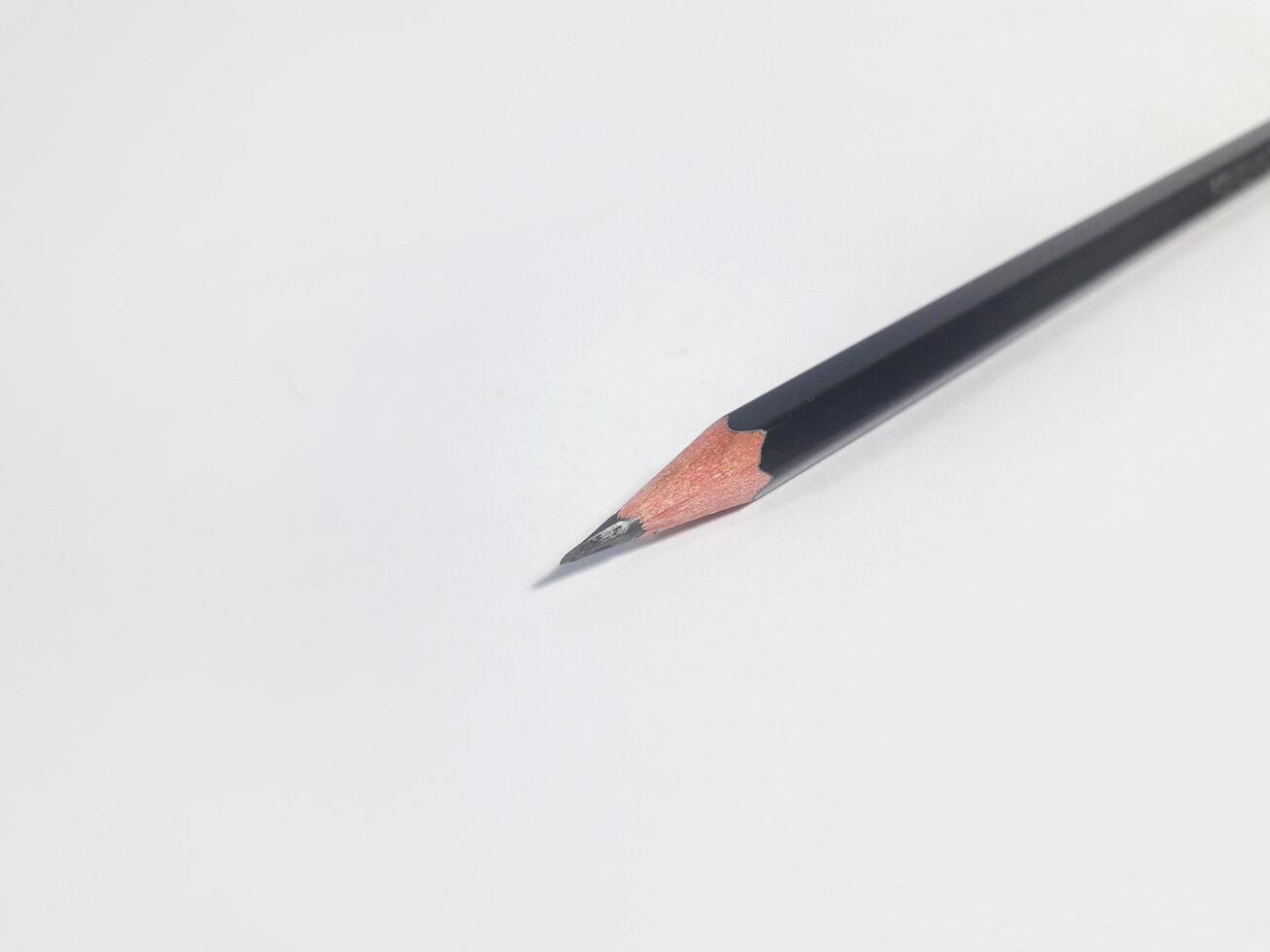 un lápiz ese tiene estado afilado y Listo a ser usado para escritura foto