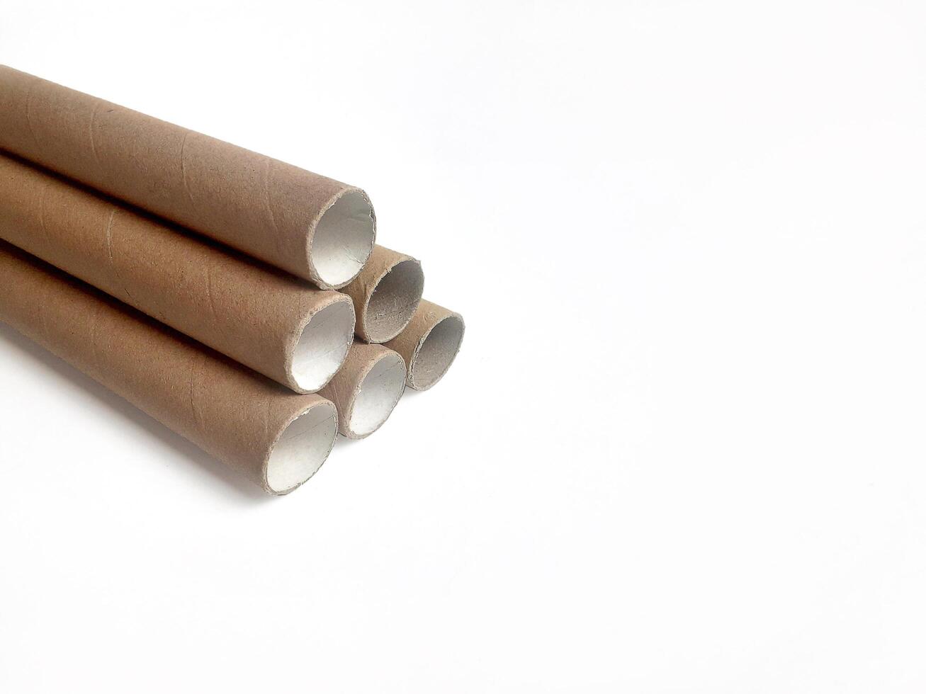 cardboard tube pipe on white background photo