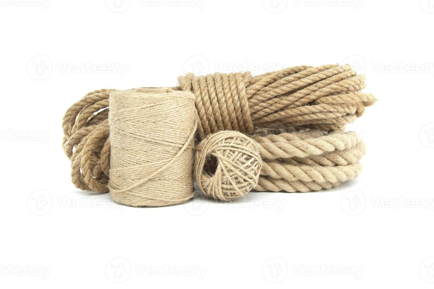 Jute ropes and twines isolated on white background photo