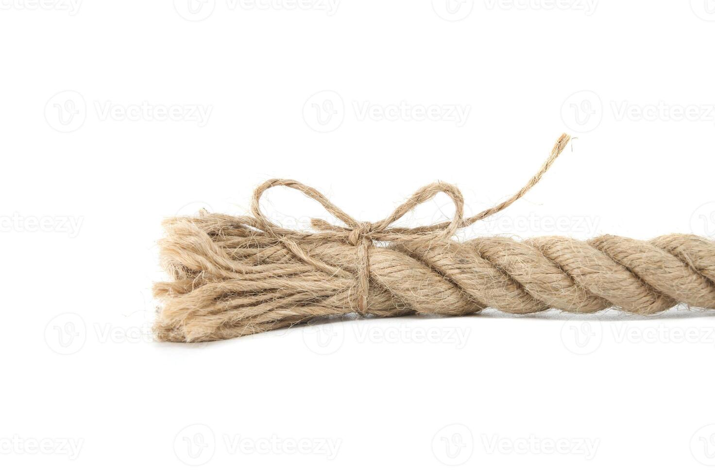 Hemp or jute rope isolated on white background photo