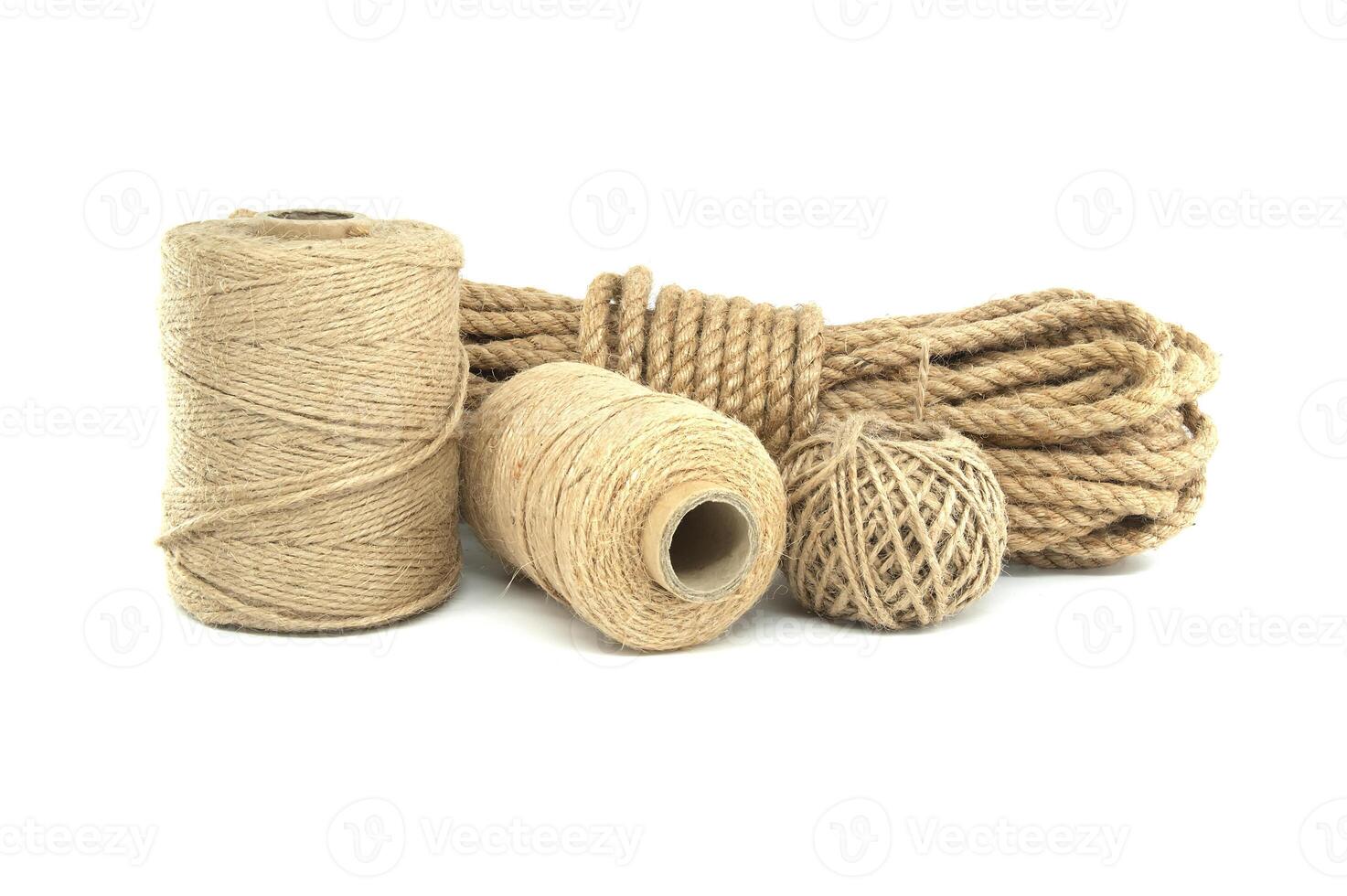 Jute ropes and twines isolated on white background photo