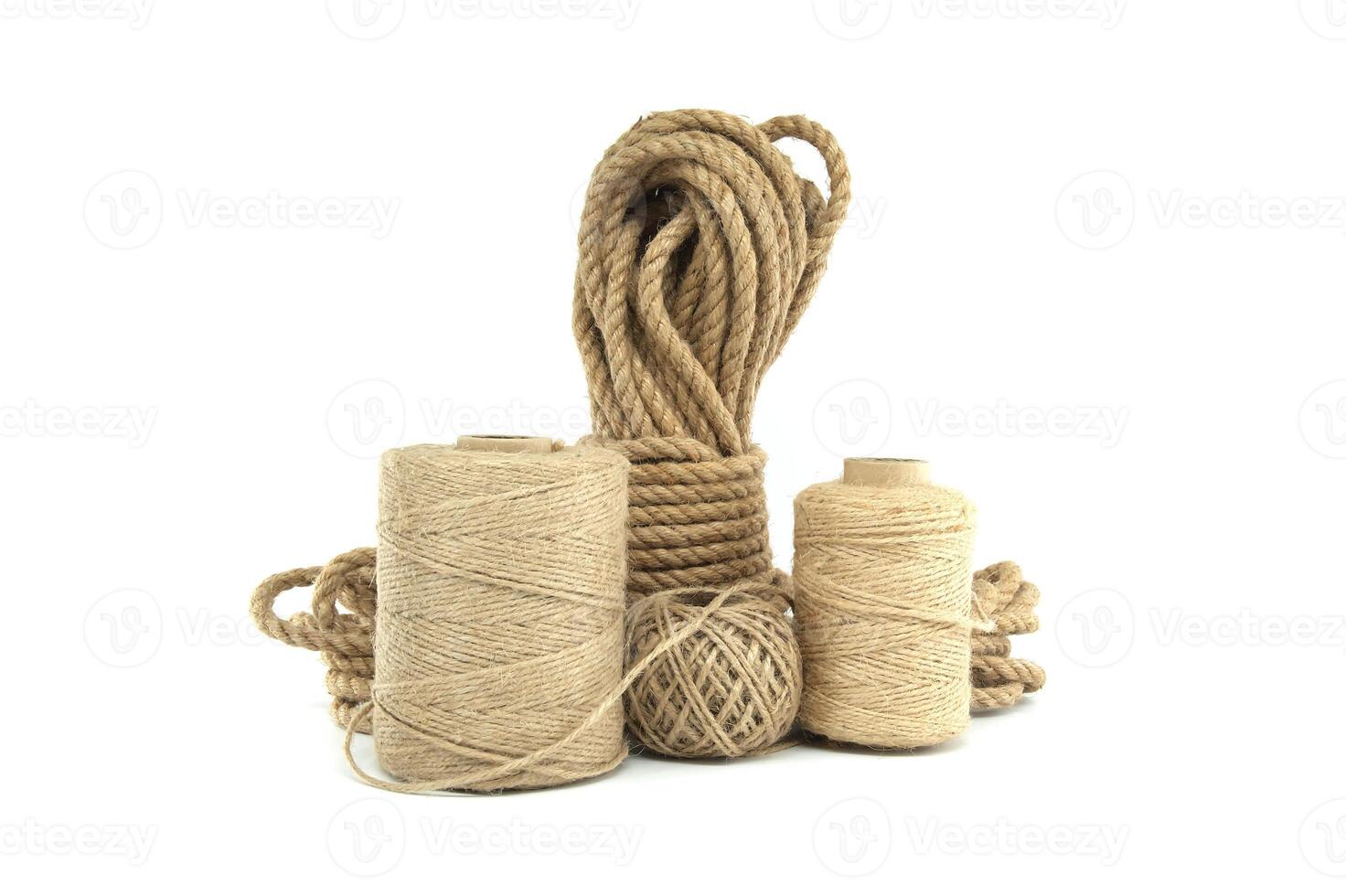Jute ropes and twines isolated on white background photo