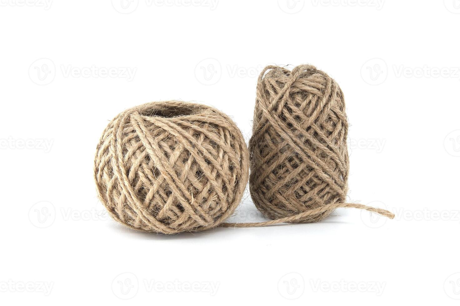 Spools of jute twine isolated on white background photo