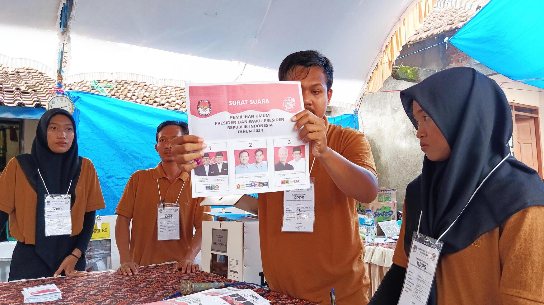 Demak, Indonesia - February, 2024 - Vote counting process at TPS, Indonesian presidential election. photo